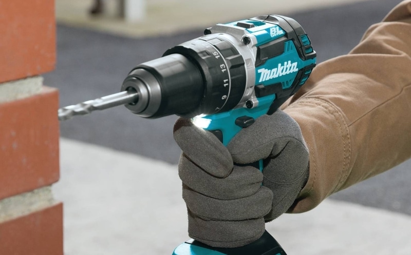 A man working with a Makita XPH12Z