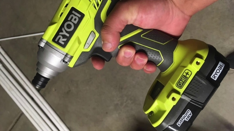 Man working with P235 Impact Driver